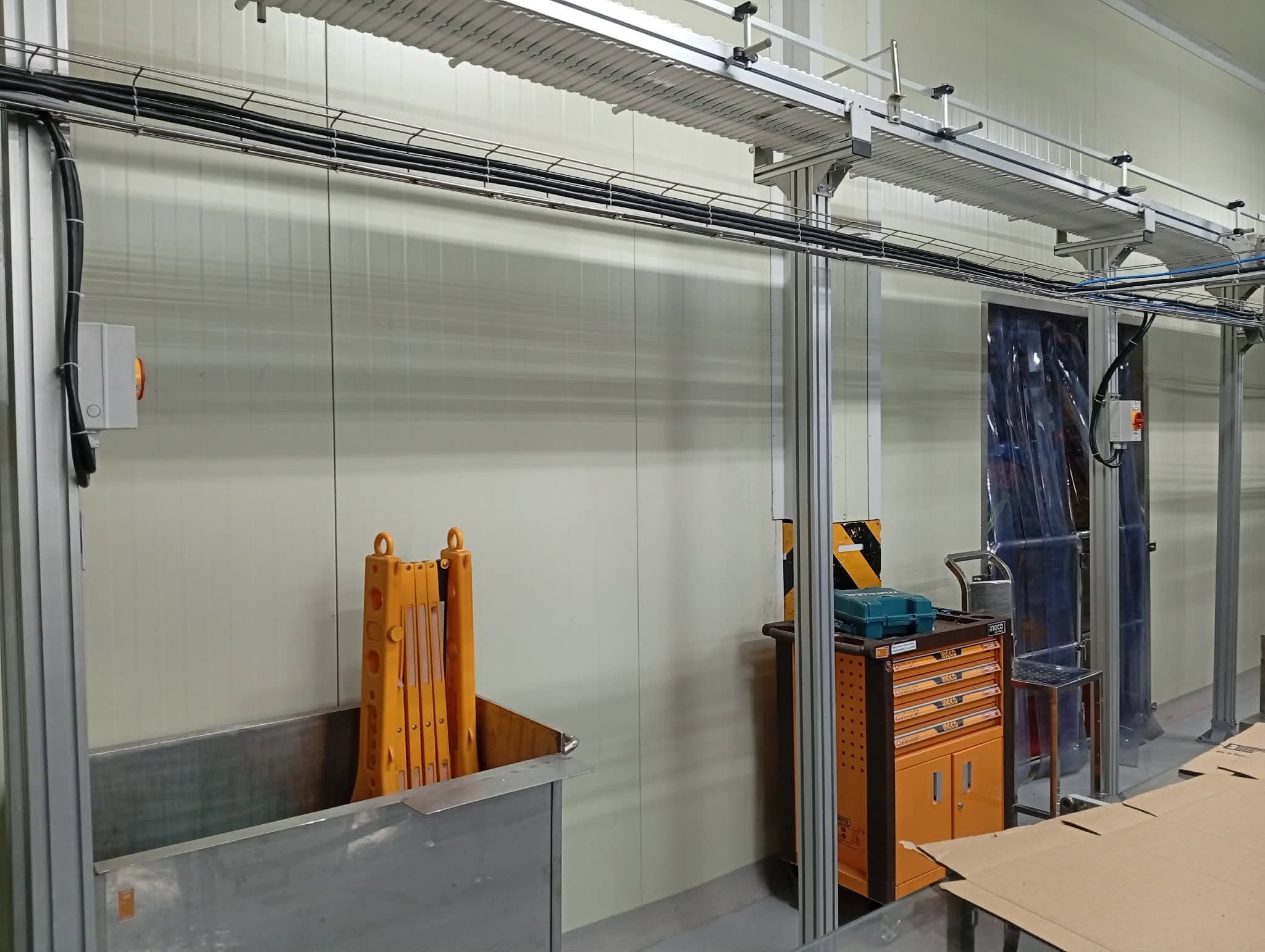 Industrial machine frame and tool cabinet in a production area